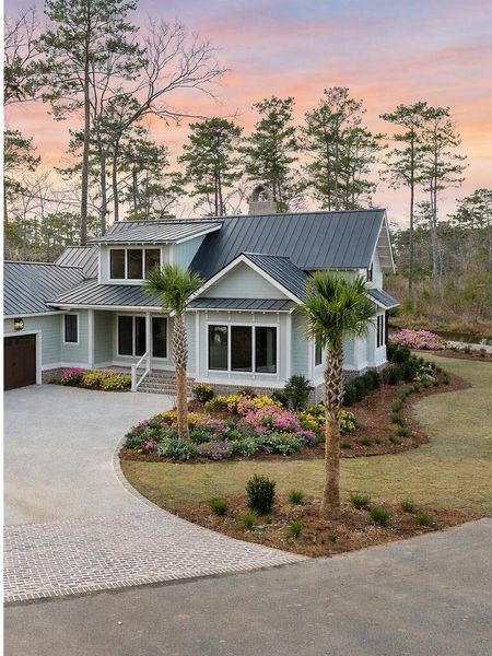 Front exterior of a new home in , Ravenel, SC, highlighting curb appeal (Image 28).