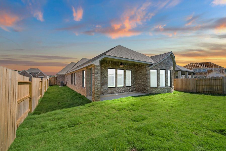 Exterior details and patio area of a home in The Trails, New Caney (Image 4).