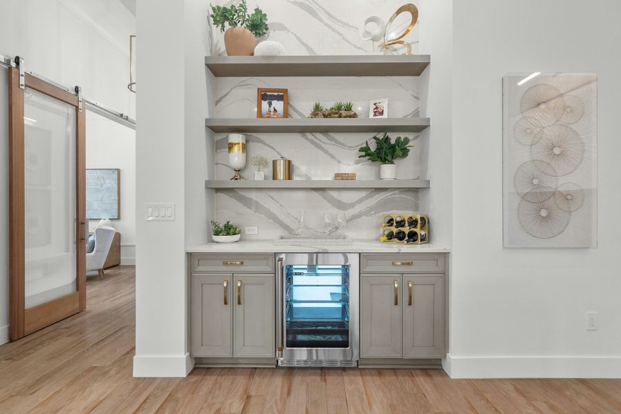 2D floor plan layout for the Indigo Grande 4 by GHO Homes in Seaglass, Vero Beach, FL (Image 12).