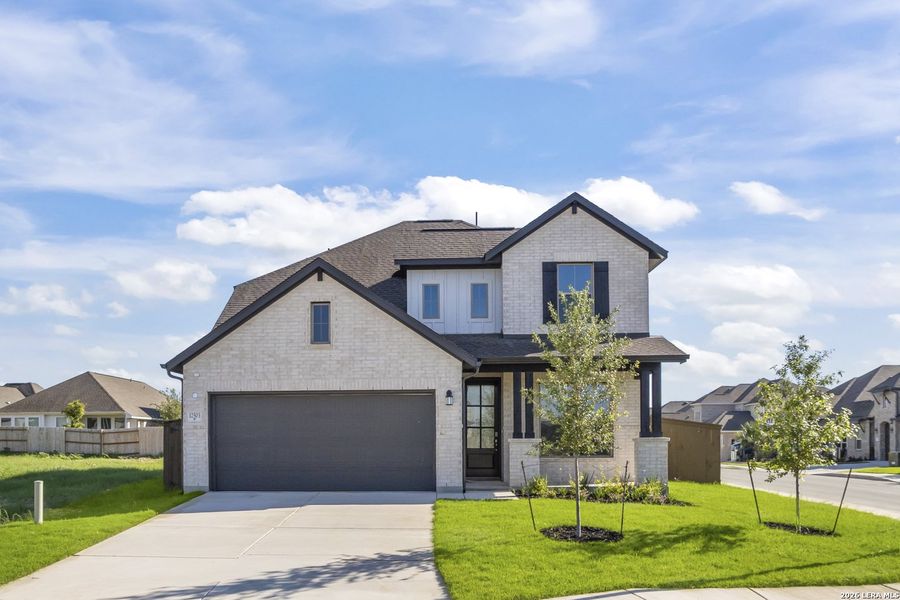 Front exterior of a new home in Stillwater Ranch, San Antonio, TX, highlighting curb appeal (Image 24).