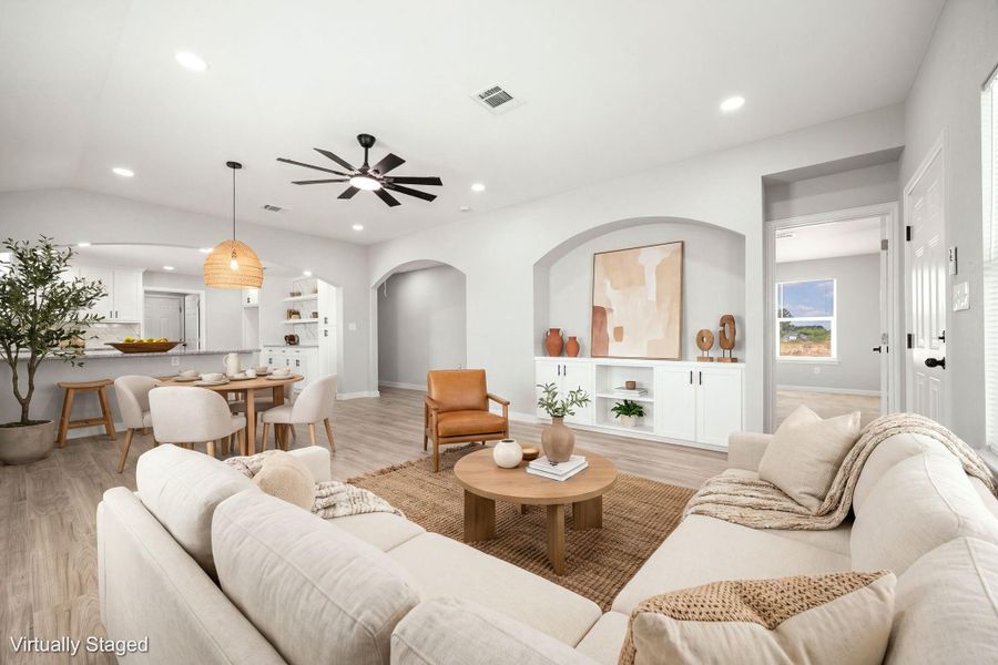 This bright and inviting living and dining area has been virtually staged to showcase the home's exceptional potential. The open-concept floor plan features neutral wall tones and sleek flooring, providing a versatile canvas for any interior design style. The living space is thoughtfully arranged to highlight comfortable seating, while the adjacent dining area is perfectly positioned to accommodate a formal table and chairs, creating an ideal setting for both daily living and effortless entertaining. Large This bright and inviting living and dining area has been virtually staged to showcase the home's exceptional potential. The open-concept floor plan features neutral wall tones and sleek flooring, providing a versatile canvas for any interior design style. The living space is thoughtfully arranged to highlight comfortable seating, while the adjacent dining area is perfectly positioned to accommodate a formal table and chairs, creating an ideal setting for both daily living and effortless entertaining. Large
