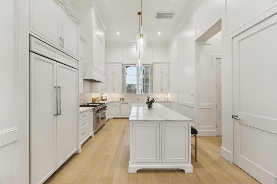 Elegant kitchen with high end appliances from Wolf and Subzero