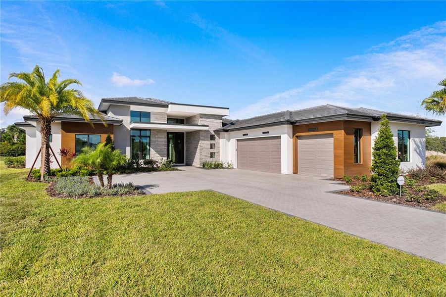 Front exterior of a new home in , Odessa, FL, highlighting curb appeal (Image 22).