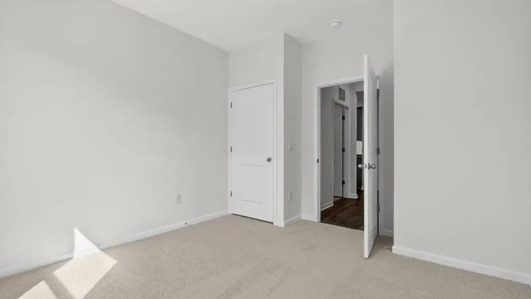 Spacious, unfurnished interior of a new home in Honeycutt Oaks, Angier (Image 26).