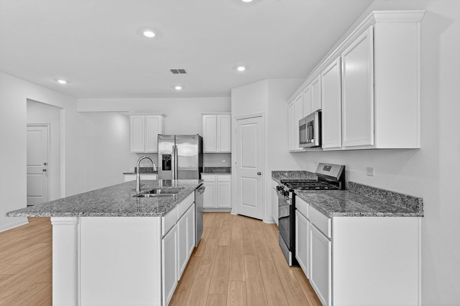 Furnished interior view inside a new home in River Ridge, Crandall (Image 6).