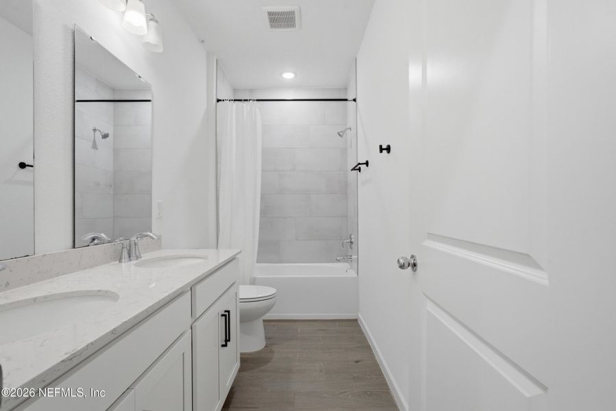 Furnished interior view inside a new home in , Jacksonville (Image 12). Furnished interior view inside a new home in , Jacksonville (Image 12).