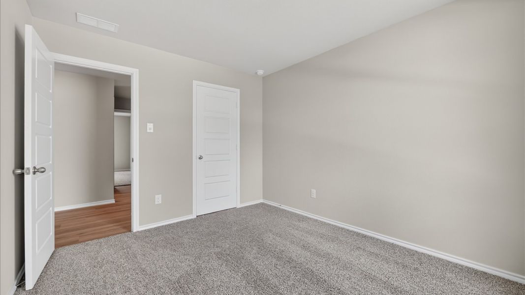 Representative unfurnished interior of a home built from the Bailey by D.R. Horton in Sunnycreek, Crowley (Image 36).