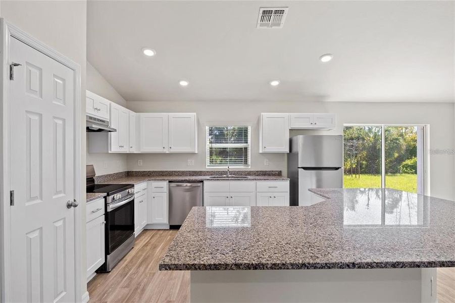 Furnished interior view inside a new home in , Port Charlotte (Image 4).