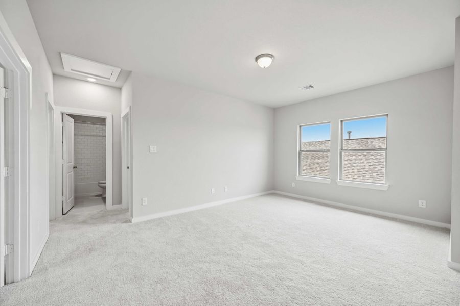 Spacious, unfurnished interior of a new home in Sunterra 40, Katy (Image 28).