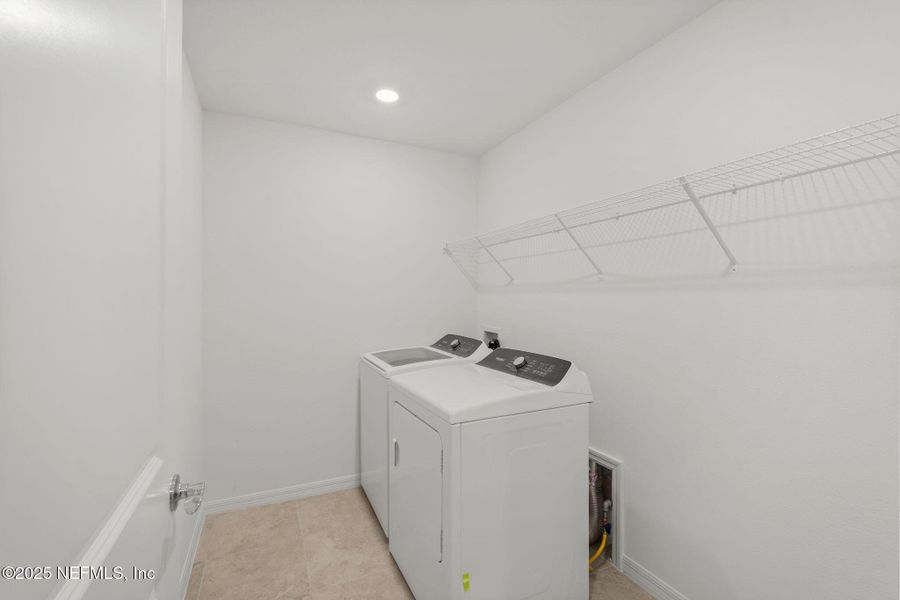 Furnished interior view inside a new home in Wells Landing, Jacksonville (Image 2).