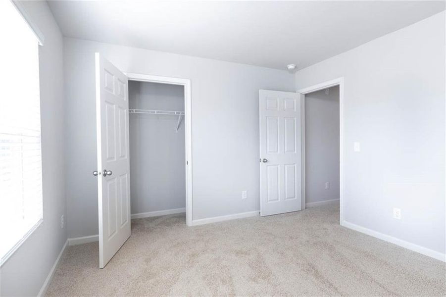 Spacious, unfurnished interior of a new home in The Reserve at Calcutta, Stockbridge (Image 29).