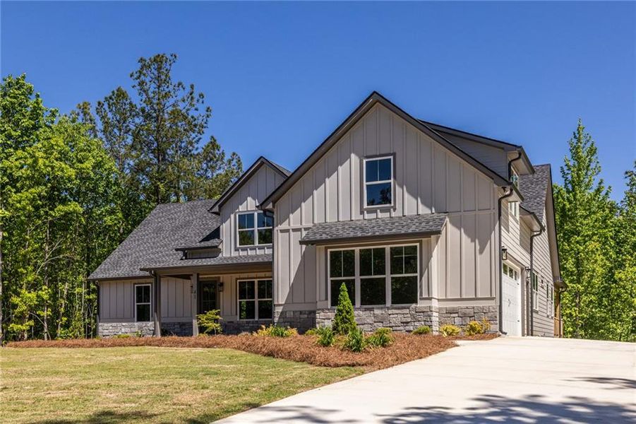 Front exterior of a new home in , Dallas, GA, highlighting curb appeal (Image 30).