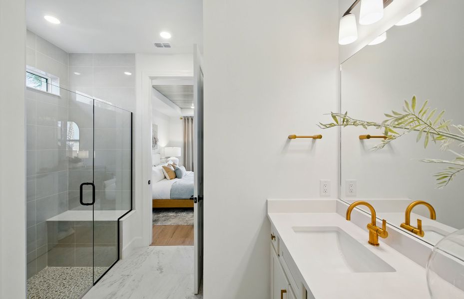 Owner's bathroom with dual sink vanity