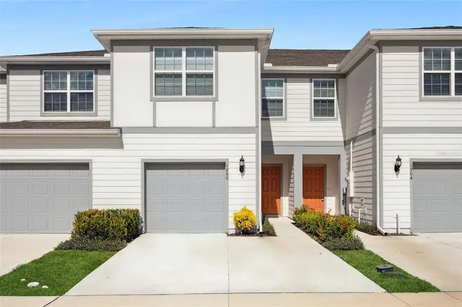 Front exterior of a new home in Grayson Square, Winter Park, FL, highlighting curb appeal (Image 1). Front exterior of a new home in Grayson Square, Winter Park, FL, highlighting curb appeal (Image 1).