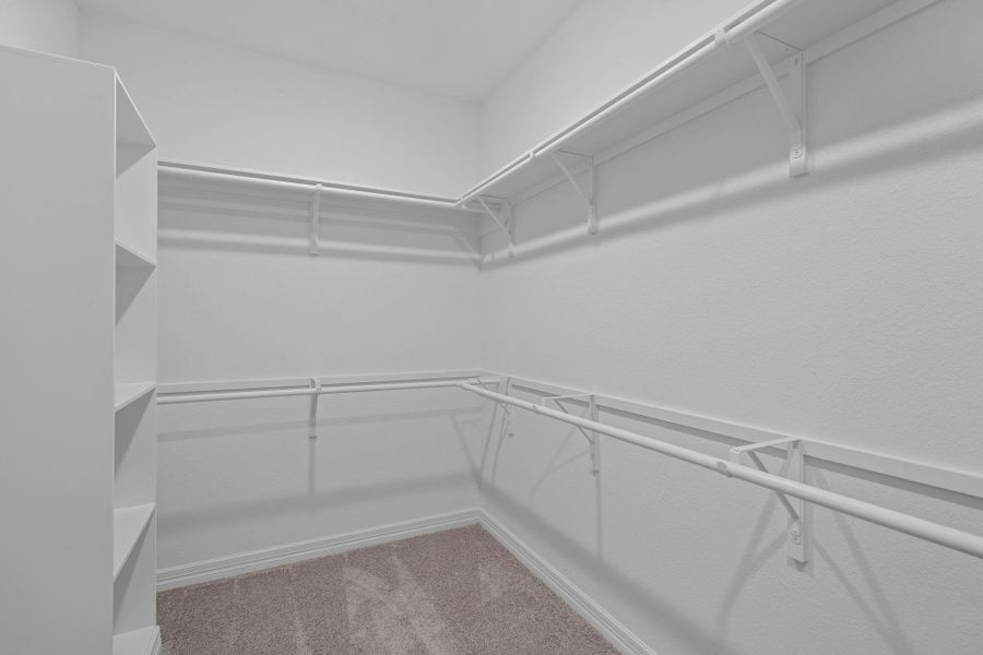 A view of your large primary walk-in Closet