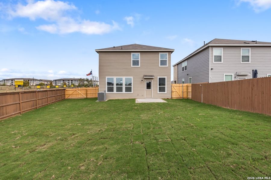 Exterior details and patio area of a home in Southton Cove, Elmendorf (Image 21).