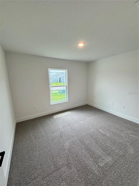 Spacious, unfurnished interior of a new home in Watercress Cove, North Port (Image 15).