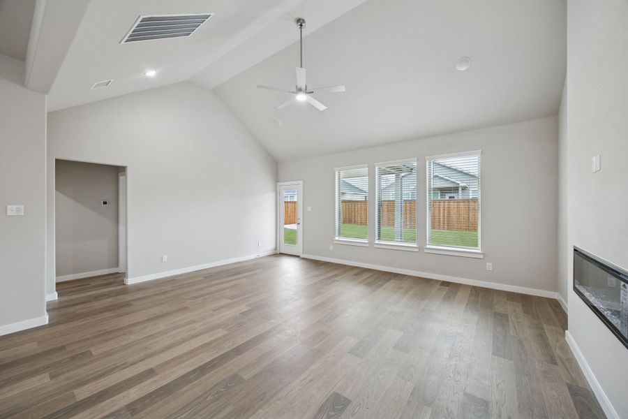 Living and Dining Rooms in the Stanley II home plan by Trophy Signature Homes – REPRESENTATIVE PHOTO