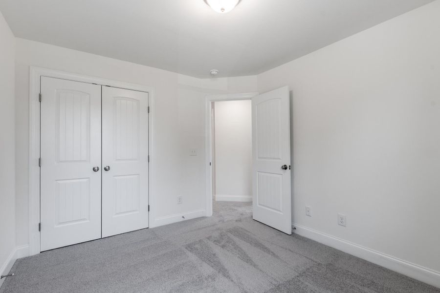 Spacious, unfurnished interior of a new home in Enclave at Traditions Townhomes, Wake Forest (Image 22).