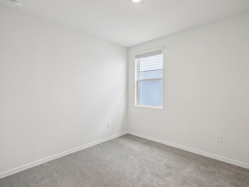 Spacious, unfurnished interior of a new home in Magnolia Bay - Premier Series, Nokomis (Image 14).