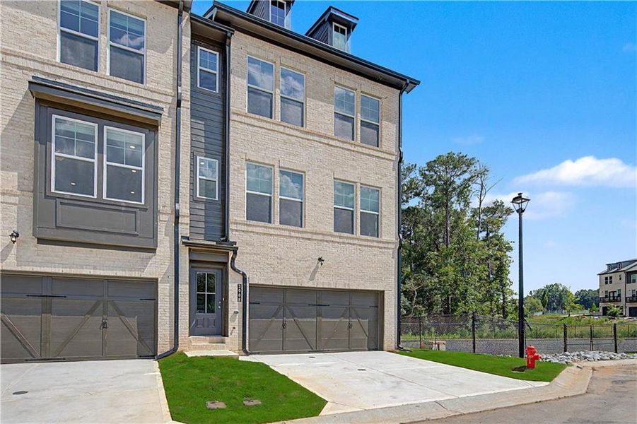 Front exterior of a new home in Daybreak, Newnan, GA, highlighting curb appeal (Image 19).