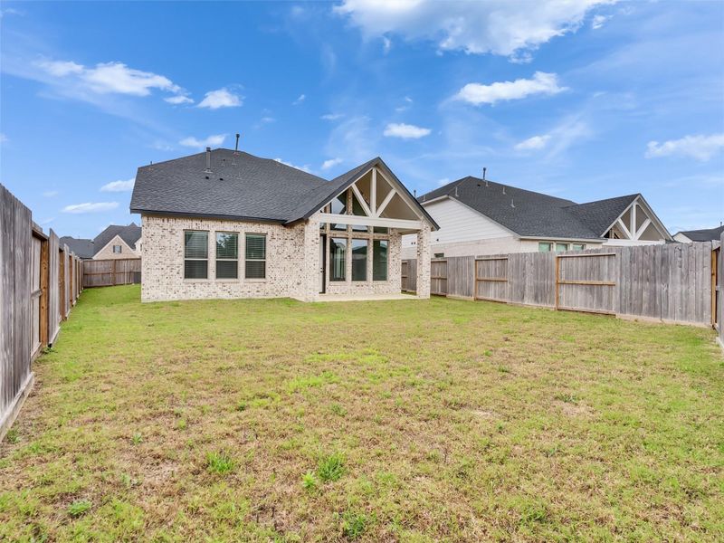 Exterior details and patio area of a home in Cross Creek West, Fulshear (Image 26).