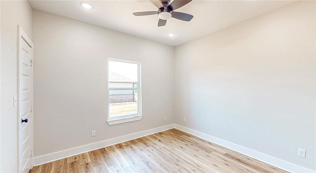 Unfurnished room featuring light wood finished floors, recessed lighting, and ceiling fan Unfurnished room featuring light wood finished floors, recessed lighting, and ceiling fan