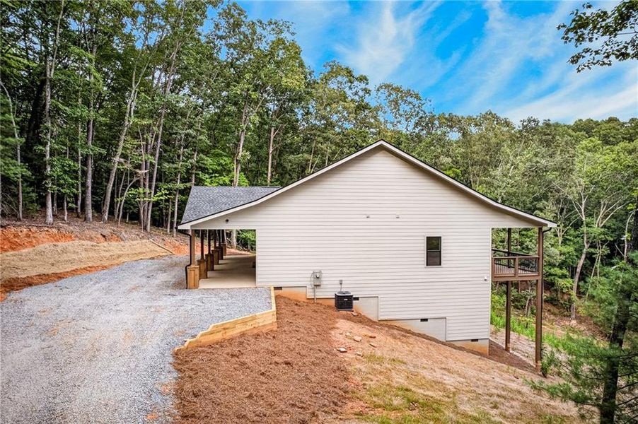 Exterior details and patio area of a home in , Ellijay (Image 27).