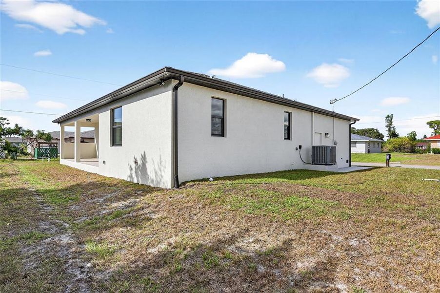 Exterior details and patio area of a home in , North Port (Image 31).