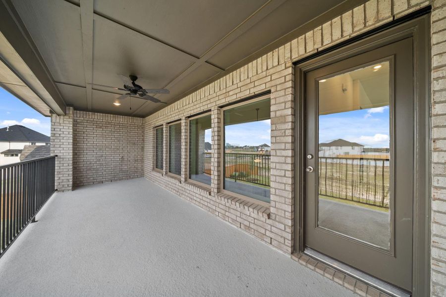 Exterior details and patio area of a home in Dunham Pointe 70', Cypress (Image 22).