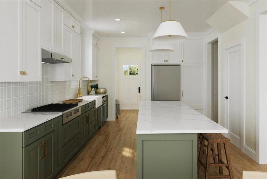 Kitchen with green cabinetry, white cabinetry, light wood finished floors, light stone countertops, and crown molding
