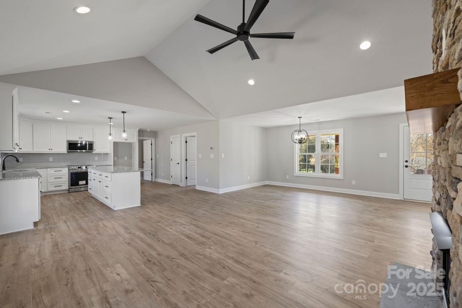 Connected kitchen, dining, and living spaces designed for easy living and entertaining. Connected kitchen, dining, and living spaces designed for easy living and entertaining.