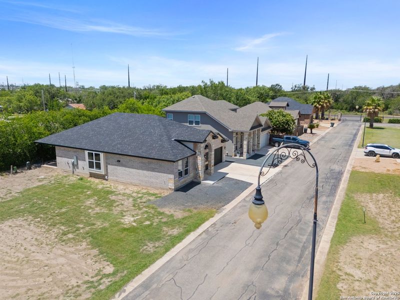 Front exterior of a new home in , Uvalde, TX, highlighting curb appeal (Image 17). Front exterior of a new home in , Uvalde, TX, highlighting curb appeal (Image 17).