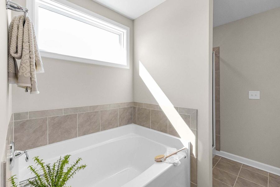 Representative furnished interior of a home built from the Aberdeen by Caviness & Cates Communities in Bartlett Manor, Youngsville (Image 186).