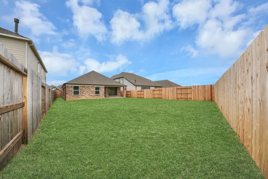 Backyard retreat, offering an abundance of space for kids to play and explore. The possibilities are endless in this outdoor haven, where the joy of open-air activities and family gatherings awaits.