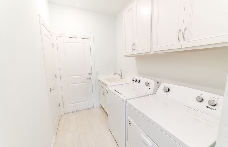 Laundry room with garage access