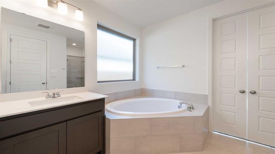 Furnished interior view inside a new home in Devonshire - Reserve 45', Forney (Image 11). Furnished interior view inside a new home in Devonshire - Reserve 45', Forney (Image 11).