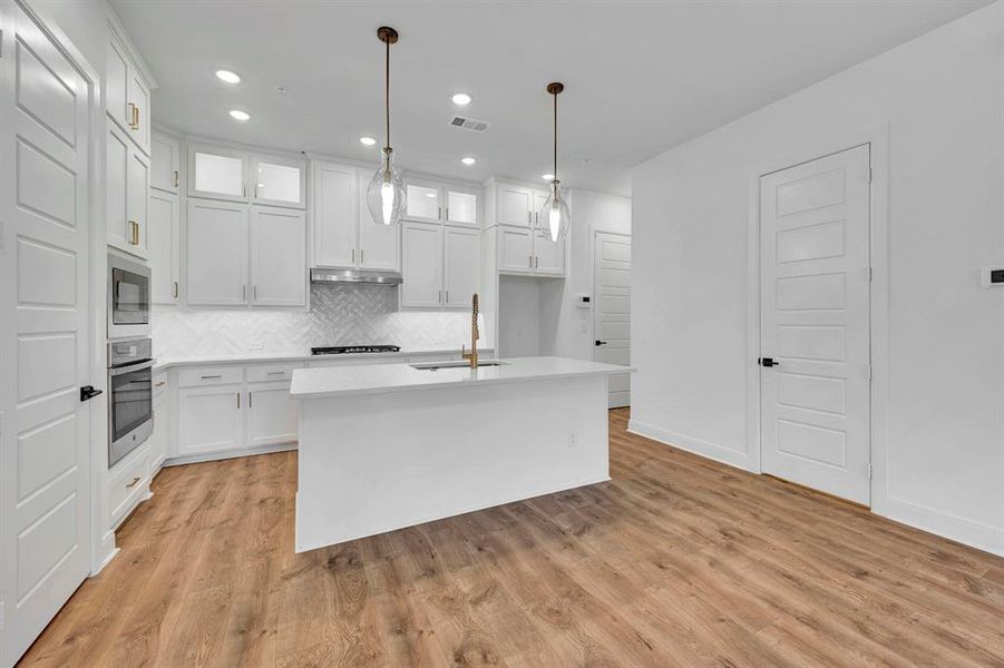 Furnished interior view inside a new home in Hillside at Las Colinas, Irving (Image 12). Furnished interior view inside a new home in Hillside at Las Colinas, Irving (Image 12).