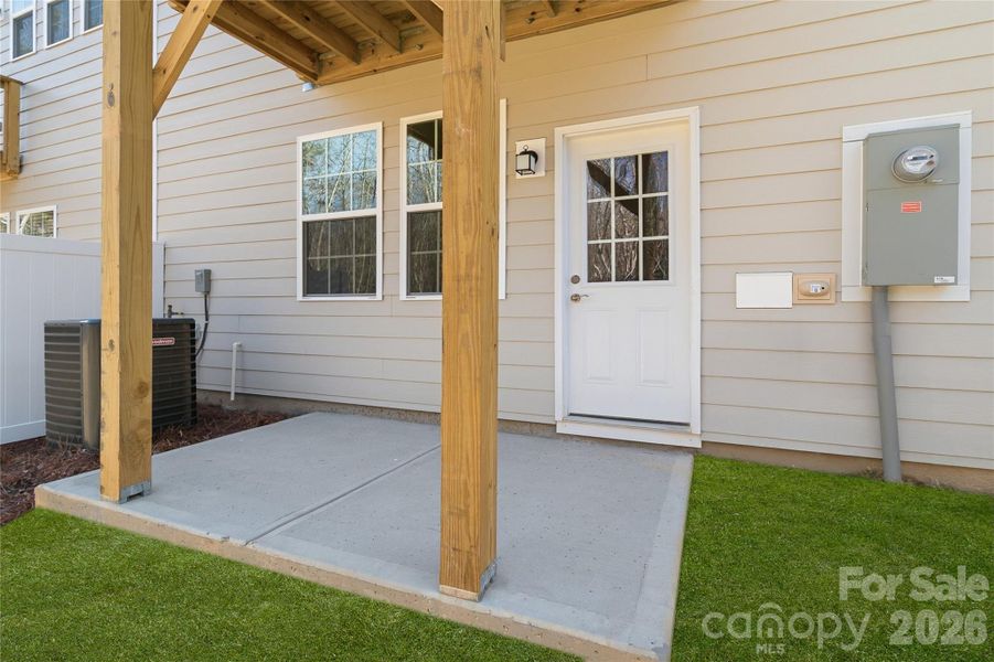 Exterior details and patio area of a home in Village of Waxhaw, Waxhaw (Image 4).