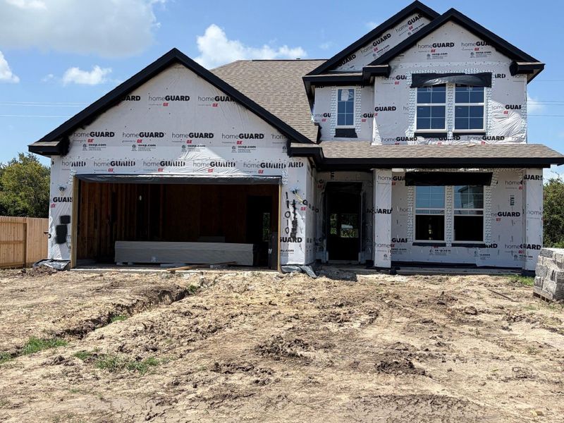 In-progress construction of a new home in Country Creek, Mont Belvieu, TX (Image 34).