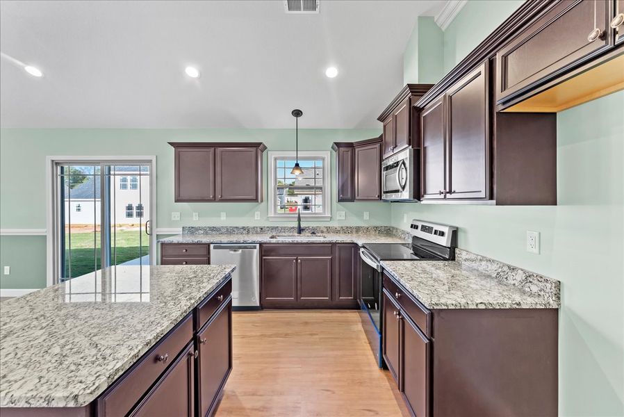 Representative furnished interior of a home built from the Rozlynn by Enchanted Homes in New Prospect Haven, Inman (Image 10).