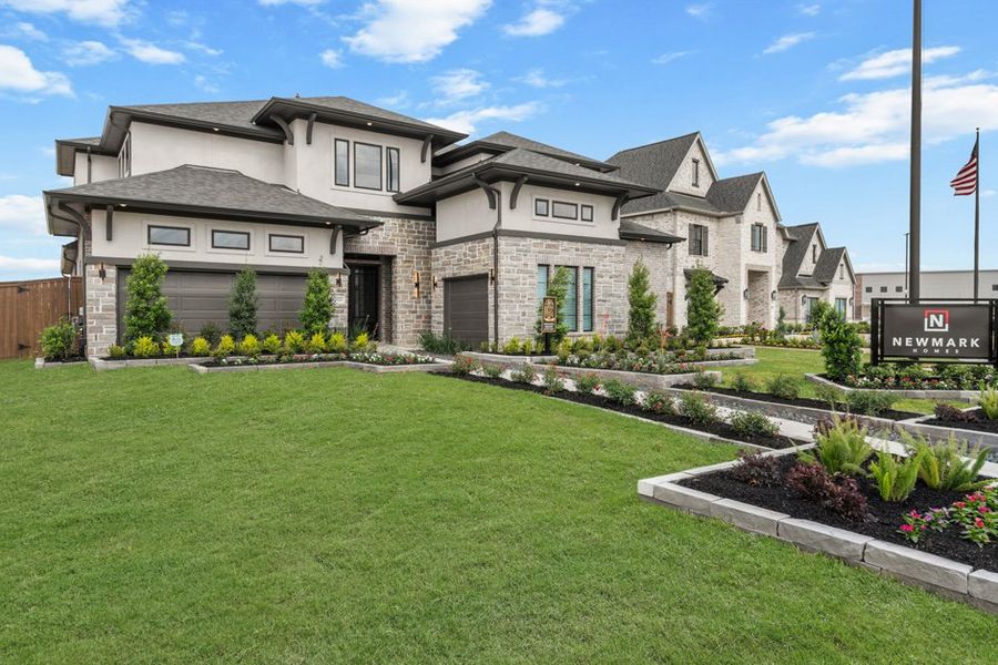 Front exterior of a new home in Legacy Prairie at Katy Court 60', Katy, TX, highlighting curb appeal (Image 2).