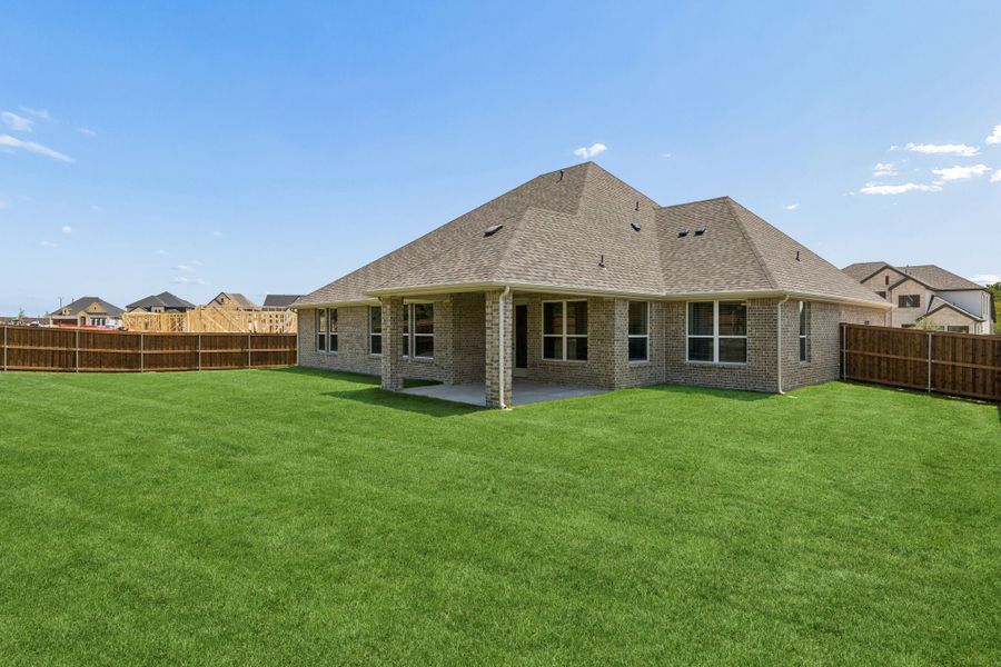 Exterior details and patio area of a home in Rainwater Crossing, Celina (Image 21). Exterior details and patio area of a home in Rainwater Crossing, Celina (Image 21).