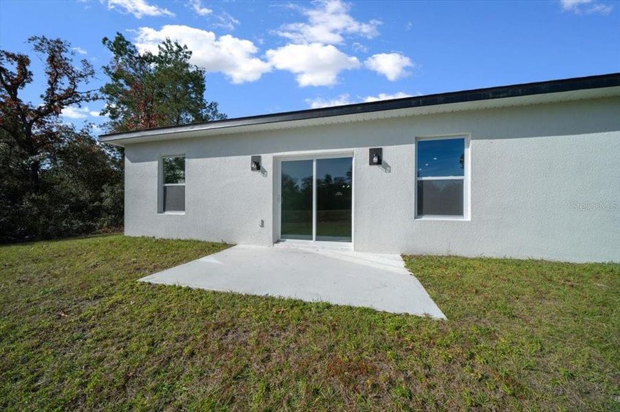 Exterior details and patio area of a home in , Ocala (Image 35).