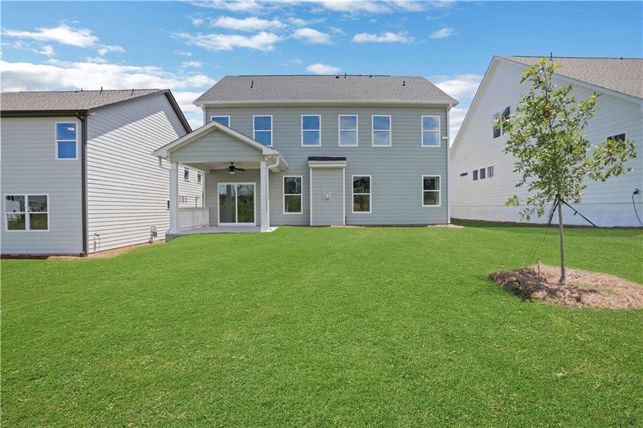 Exterior details and patio area of a home in Twin Lakes, Hoschton (Image 4).