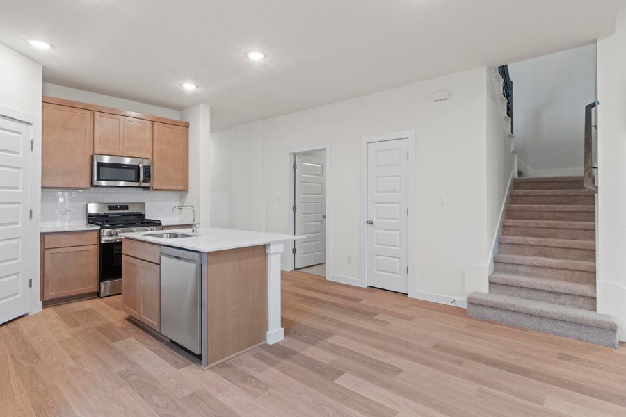 Kitchen in the Pearl home plan by Trophy Signature Homes – REPRESENTATIVE PHOTO Kitchen in the Pearl home plan by Trophy Signature Homes – REPRESENTATIVE PHOTO
