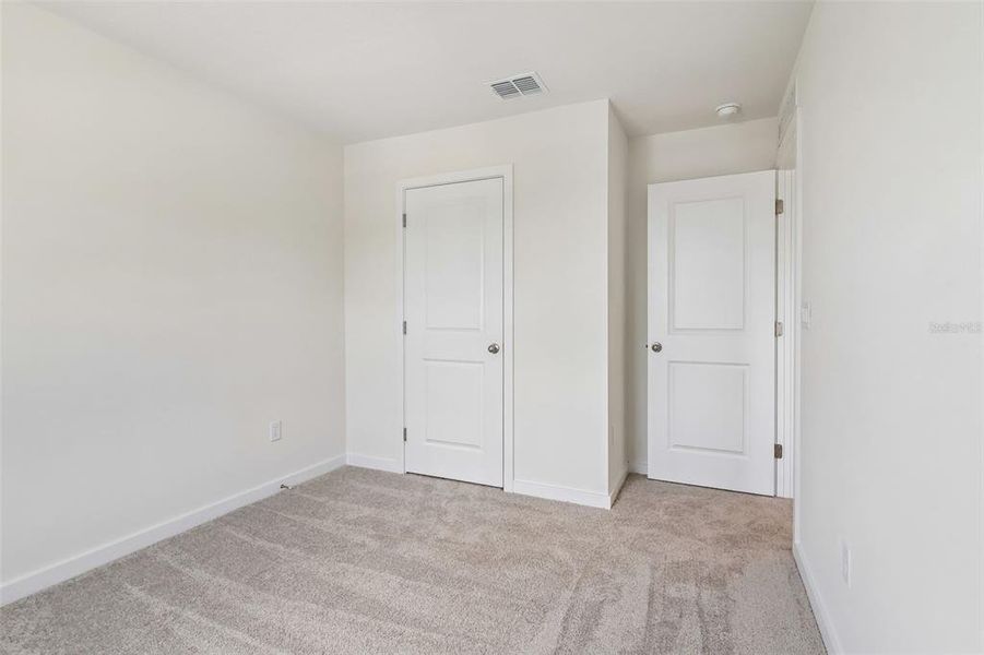 Spacious, unfurnished interior of a new home in Cyrene at Harmony, St. Cloud (Image 22). Spacious, unfurnished interior of a new home in Cyrene at Harmony, St. Cloud (Image 22).