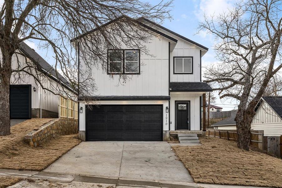 View of front of home with a garage