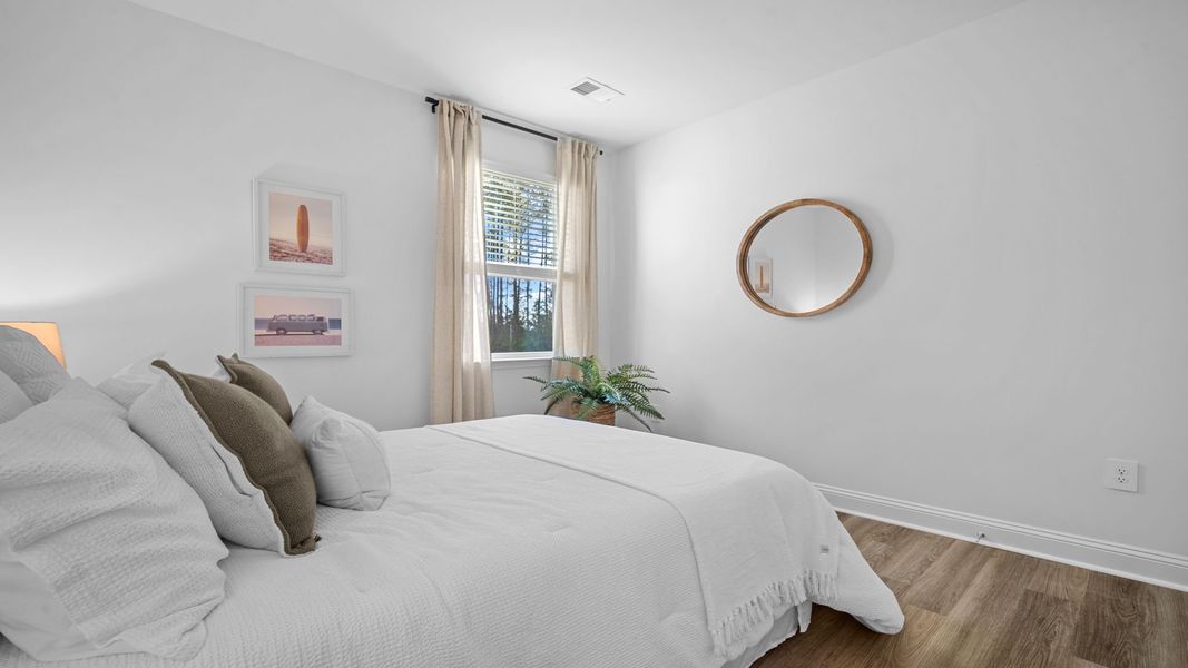 Furnished interior view inside a new home in The Lakes at North Glynn, Brunswick (Image 23).
