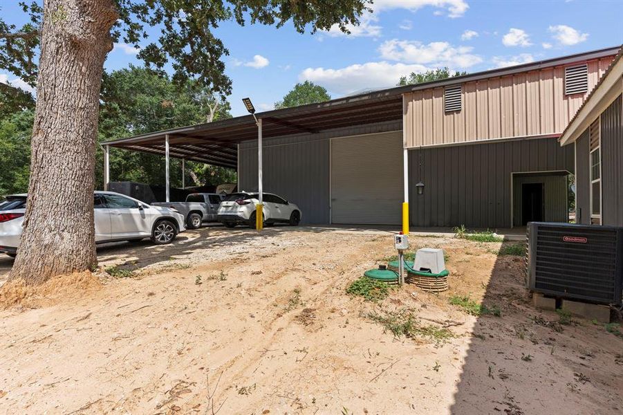 The shop was constructed by Juan, a master metal building builder and roofer. It spans an area of 80 feet by 58 feet, totaling 4,640 square feet under the metal roof. The interior of the shop measures 40 feet by 60 feet, providing 2,400 square feet of space. Both the ceilings and walls are insulated with fiberglass.